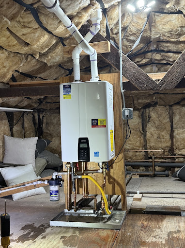 Navien tankless water heater installation with gas, water and vent piping