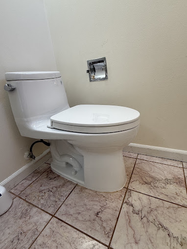TOTO UltraMax toilet installed in residential bathroom